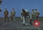 Image of Airmen amuse themselves pitching coins United Kingdom, 1943, second 61 stock footage video 65675061382