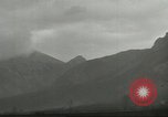 Image of shell explosions Cassino Italy, 1944, second 14 stock footage video 65675061472