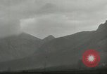 Image of shell explosions Cassino Italy, 1944, second 17 stock footage video 65675061472
