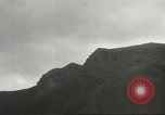 Image of shell explosions Cassino Italy, 1944, second 18 stock footage video 65675061472