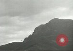Image of shell explosions Cassino Italy, 1944, second 25 stock footage video 65675061472
