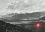 Image of shell explosions Cassino Italy, 1944, second 26 stock footage video 65675061472