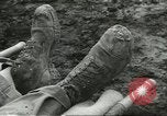 Image of dead American soldier Cassino Italy, 1944, second 10 stock footage video 65675061474