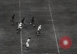 Standbild College Football Spiel New Orleans Louisiana USA, 1944, aus Sekunde 17 historischem Filmmaterial Videoclip 65675061499