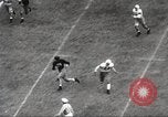 Standbild College Football Spiel New Orleans Louisiana USA, 1944, aus Sekunde 41 historischem Filmmaterial Videoclip 65675061499
