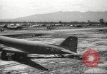 Standbild Allied P-40 Flugzeuge bombardieren Japanisch an Myitkina in Zweiten Weltkrieg Birma, 1944, aus Sekunde 15 historischem Filmmaterial Videoclip 65675061532