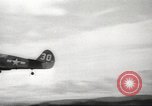 Standbild Allied P-40 Flugzeuge bombardieren Japanisch an Myitkina in Zweiten Weltkrieg Birma, 1944, aus Sekunde 20 historischem Filmmaterial Videoclip 65675061532
