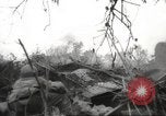 Standbild Allied P-40 Flugzeuge bombardieren Japanisch an Myitkina in Zweiten Weltkrieg Birma, 1944, aus Sekunde 33 historischem Filmmaterial Videoclip 65675061532