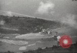 Standbild Allied P-40 Flugzeuge bombardieren Japanisch an Myitkina in Zweiten Weltkrieg Birma, 1944, aus Sekunde 47 historischem Filmmaterial Videoclip 65675061532