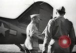 Standbild Allied P-40 Flugzeuge bombardieren Japanisch an Myitkina in Zweiten Weltkrieg Birma, 1944, aus Sekunde 60 historischem Filmmaterial Videoclip 65675061532