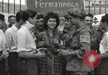 Image of U.S. Paratrooper talks with  French Forces of Interior Saint Tropez France, 1944, second 3 stock footage video 65675061547