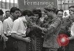 Image of U.S. Paratrooper talks with  French Forces of Interior Saint Tropez France, 1944, second 5 stock footage video 65675061547