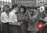 Image of U.S. Paratrooper talks with  French Forces of Interior Saint Tropez France, 1944, second 9 stock footage video 65675061547