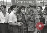 Image of U.S. Paratrooper talks with  French Forces of Interior Saint Tropez France, 1944, second 14 stock footage video 65675061547