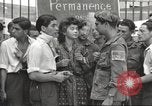 Image of U.S. Paratrooper talks with  French Forces of Interior Saint Tropez France, 1944, second 16 stock footage video 65675061547