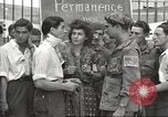 Image of U.S. Paratrooper talks with  French Forces of Interior Saint Tropez France, 1944, second 17 stock footage video 65675061547