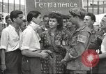 Image of U.S. Paratrooper talks with  French Forces of Interior Saint Tropez France, 1944, second 18 stock footage video 65675061547