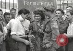 Image of U.S. Paratrooper talks with  French Forces of Interior Saint Tropez France, 1944, second 22 stock footage video 65675061547