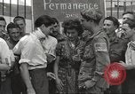 Image of U.S. Paratrooper talks with  French Forces of Interior Saint Tropez France, 1944, second 23 stock footage video 65675061547