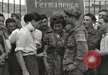 Image of U.S. Paratrooper talks with  French Forces of Interior Saint Tropez France, 1944, second 24 stock footage video 65675061547