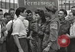 Image of U.S. Paratrooper talks with  French Forces of Interior Saint Tropez France, 1944, second 26 stock footage video 65675061547
