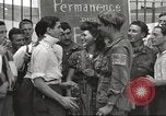 Image of U.S. Paratrooper talks with  French Forces of Interior Saint Tropez France, 1944, second 27 stock footage video 65675061547