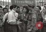 Image of U.S. Paratrooper talks with  French Forces of Interior Saint Tropez France, 1944, second 29 stock footage video 65675061547