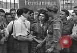 Image of U.S. Paratrooper talks with  French Forces of Interior Saint Tropez France, 1944, second 31 stock footage video 65675061547