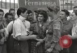 Image of U.S. Paratrooper talks with  French Forces of Interior Saint Tropez France, 1944, second 33 stock footage video 65675061547