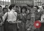Image of U.S. Paratrooper talks with  French Forces of Interior Saint Tropez France, 1944, second 34 stock footage video 65675061547