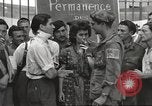 Image of U.S. Paratrooper talks with  French Forces of Interior Saint Tropez France, 1944, second 36 stock footage video 65675061547