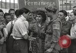 Image of U.S. Paratrooper talks with  French Forces of Interior Saint Tropez France, 1944, second 38 stock footage video 65675061547