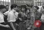 Image of U.S. Paratrooper talks with  French Forces of Interior Saint Tropez France, 1944, second 49 stock footage video 65675061547
