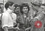 Image of U.S. Paratrooper talks with  French Forces of Interior Saint Tropez France, 1944, second 52 stock footage video 65675061547