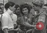 Image of U.S. Paratrooper talks with  French Forces of Interior Saint Tropez France, 1944, second 53 stock footage video 65675061547