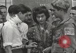 Image of U.S. Paratrooper talks with  French Forces of Interior Saint Tropez France, 1944, second 54 stock footage video 65675061547