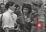 Image of U.S. Paratrooper talks with  French Forces of Interior Saint Tropez France, 1944, second 56 stock footage video 65675061547
