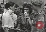 Image of U.S. Paratrooper talks with  French Forces of Interior Saint Tropez France, 1944, second 57 stock footage video 65675061547