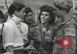 Image of U.S. Paratrooper talks with  French Forces of Interior Saint Tropez France, 1944, second 61 stock footage video 65675061547