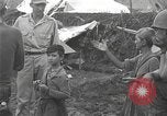 Standbild Merrill's Marauders Myitkyina Myanmar, 1944, aus Sekunde 16 historischem Filmmaterial Videoclip 65675061584