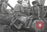 Standbild Merrill's Marauders Myitkyina Myanmar, 1944, aus Sekunde 27 historischem Filmmaterial Videoclip 65675061584
