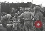 Standbild Merrill's Marauders Myitkyina Myanmar, 1944, aus Sekunde 34 historischem Filmmaterial Videoclip 65675061584