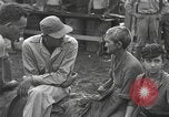 Standbild Merrill's Marauders Myitkyina Myanmar, 1944, aus Sekunde 49 historischem Filmmaterial Videoclip 65675061584