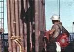 Image of offshore oil rig Atlantic Ocean, 1965, second 1 stock footage video 65675061603