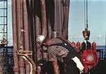 Image of offshore oil rig Atlantic Ocean, 1965, second 5 stock footage video 65675061603