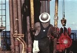 Image of offshore oil rig Atlantic Ocean, 1965, second 11 stock footage video 65675061603