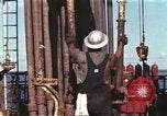 Image of offshore oil rig Atlantic Ocean, 1965, second 13 stock footage video 65675061603