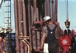Image of offshore oil rig Atlantic Ocean, 1965, second 14 stock footage video 65675061603