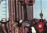 Image of offshore oil rig Atlantic Ocean, 1965, second 15 stock footage video 65675061603