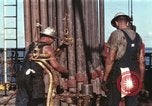 Image of offshore oil rig Atlantic Ocean, 1965, second 23 stock footage video 65675061603